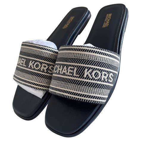 Michael Kors Women's Slippers .